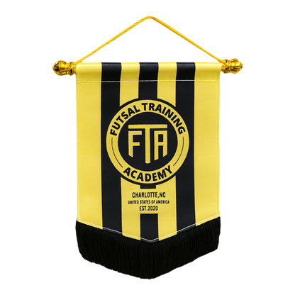 Yellow and black striped banner with 'Futsal Training Academy' logo 